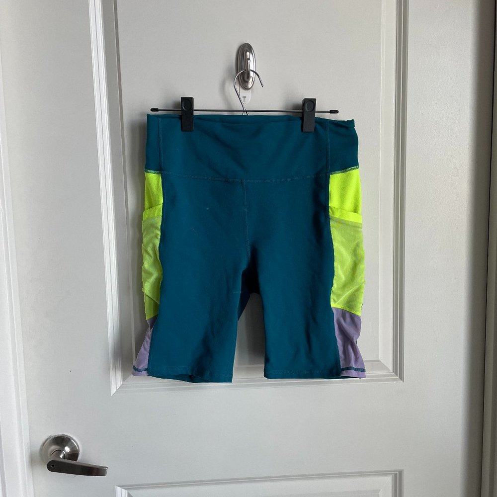 Fabletics Powerhold Neon Biker Shorts with Side Pockets